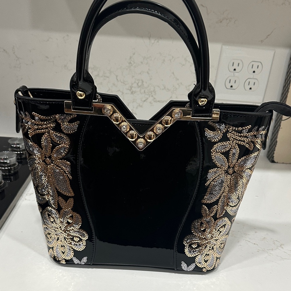 Elegant Black and Gold Women's Handbag